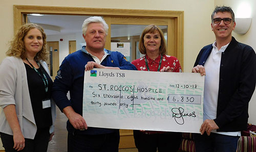 Tim Arnold Colin Lawson present a cheque for £6,830 to St Rocco's Hospice